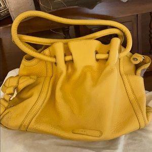 Cole Haan slouchy leather hand bag. Mustard Yellow